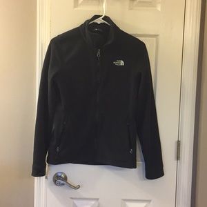 The North Face fleece XS black jacket pockets.